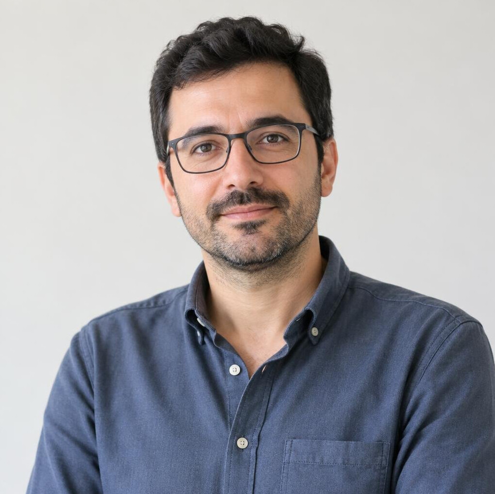 Portrait of a Turkish man data journalist with glasses
